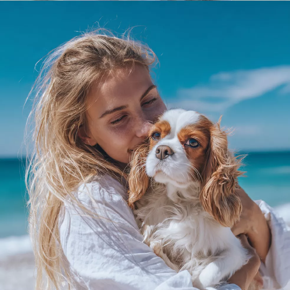 wbsoft_photo_of_a_blonde_woman_holding_her_king_charles_spaniel_da32d6c7-40d6-4efe-91d8-70b78bfc37ca_04.jpg